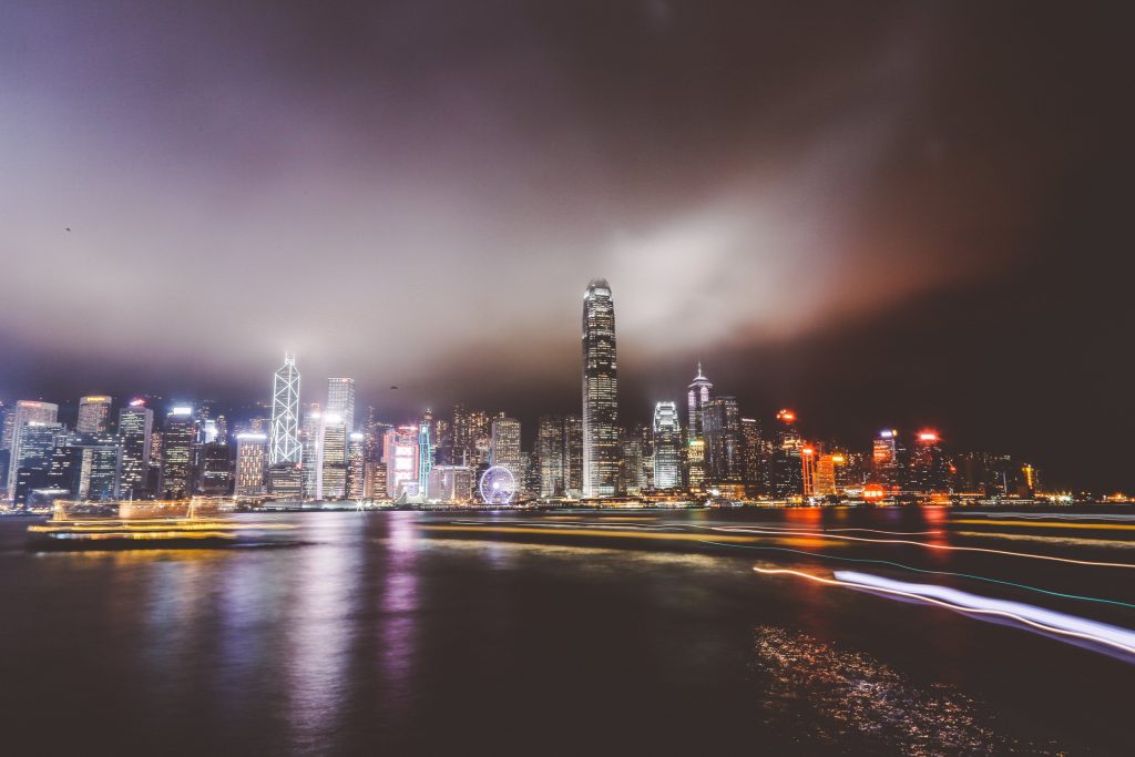 A city waterfront lit up at night